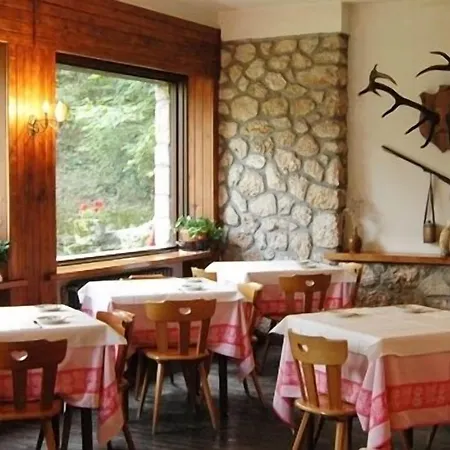 מלון Garni Mille Pini 3*